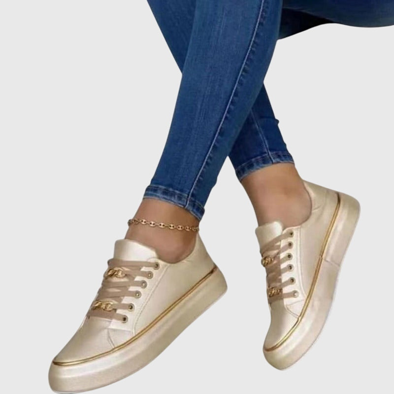 Elegant gold women's orthopaedic shoes, providing posture correction, arch support, and stylish everyday wear.