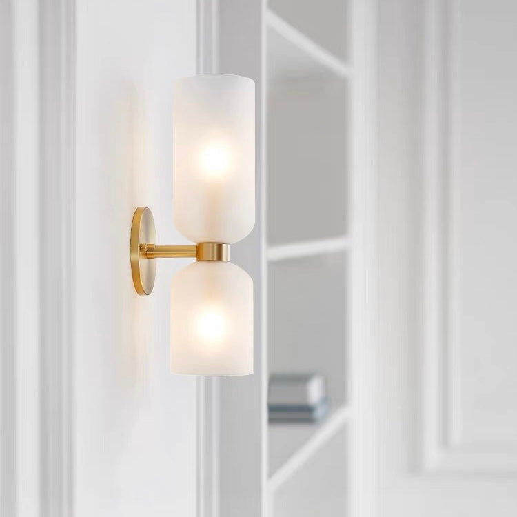 Contemporary glass twin wall lamp with dual shades, perfect for modern home lighting.