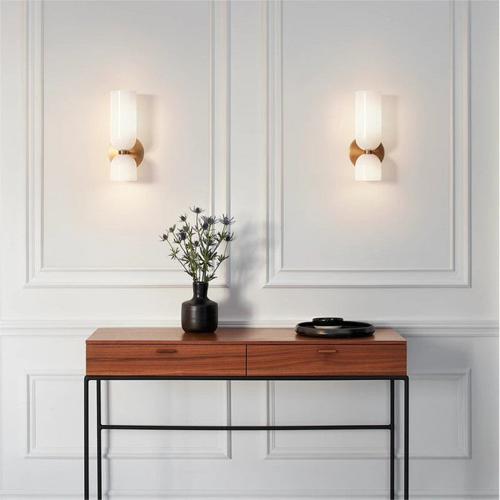 Elegant glass twin wall light, providing ambient light for living rooms and interior decor.