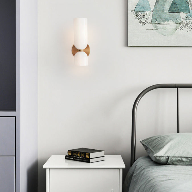 Modern glass wall lamp, stylish twin design for contemporary home lighting solutions.