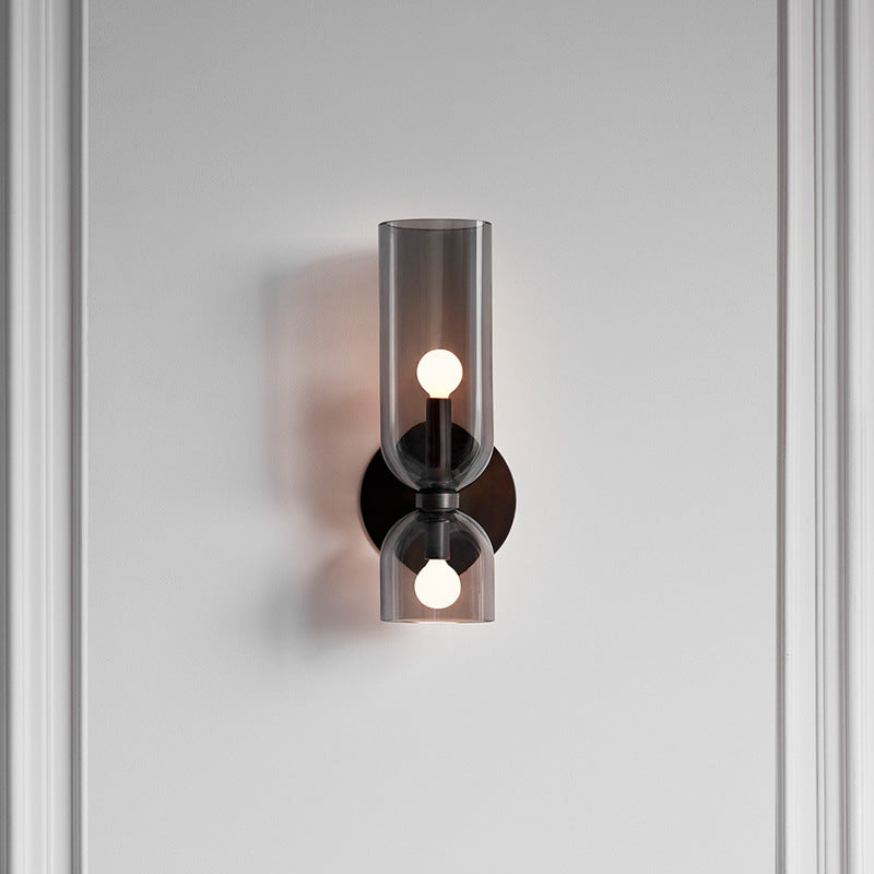 Elegant glass twin wall sconce, ideal modern lighting for any room's interior decor.