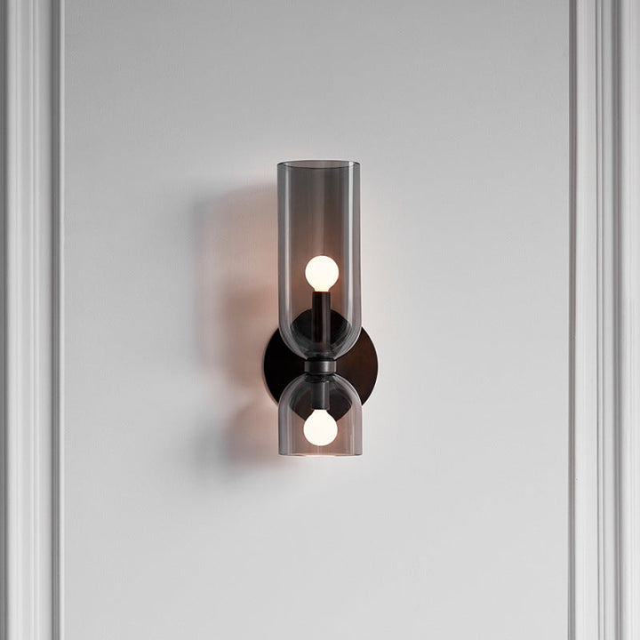 Elegant glass twin wall sconce, ideal modern lighting for any room's interior decor.