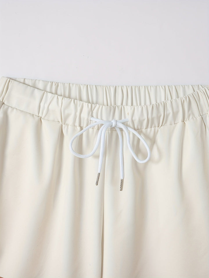Beige striped men's co-ord set: a stylish short sleeve shirt and comfy drawstring shorts for summer outfits.