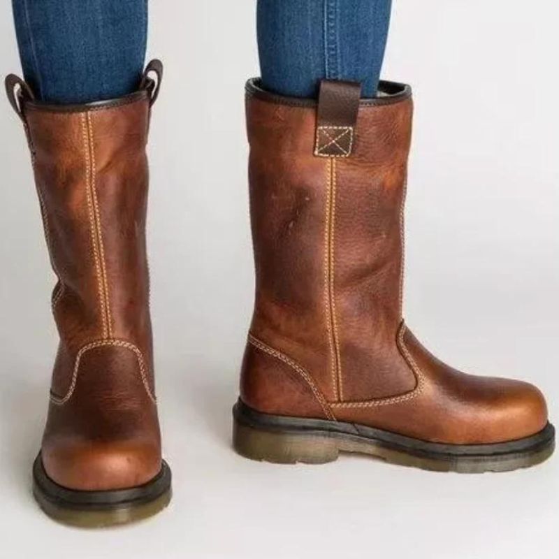 Men's casual pull-on ankle boots, featuring a durable lug sole for winter comfort and stylish fall footwear.