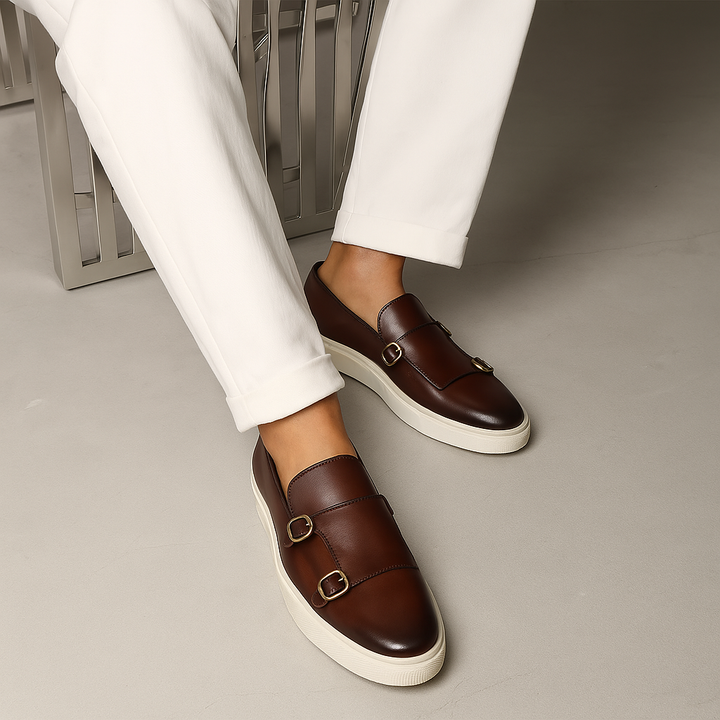 Classic black men's buckle loafers. Sophisticated men's fashion footwear, great for business or casual outfits.