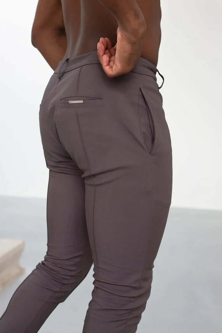 Modern men's slim fit long trousers, combining comfort and versatile style for any sophisticated wardrobe.