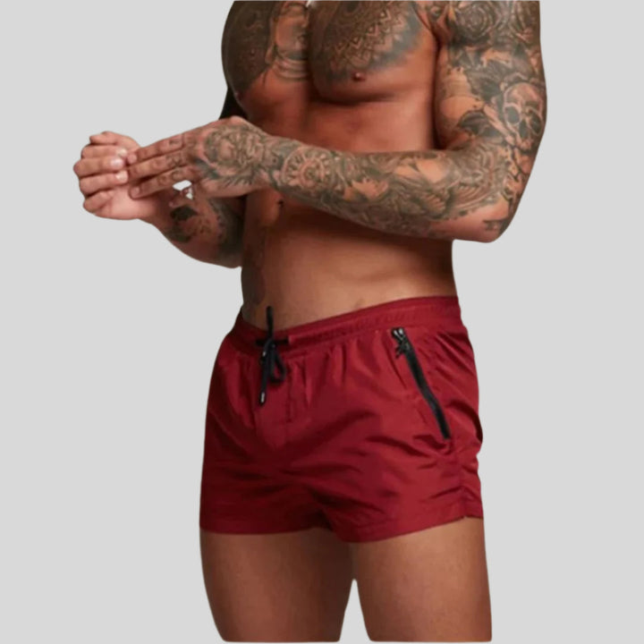 Men's stylish quick-dry swim trunks for beach. Perfect for summer fashion, poolside & vacation.