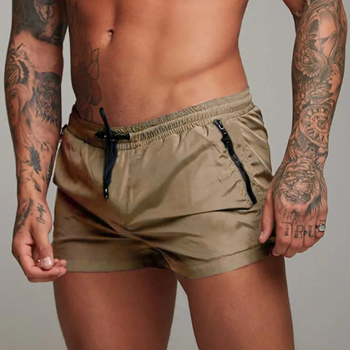 Stylish men's quick-dry swim trunks, versatile for beachwear, poolside, and vacation.