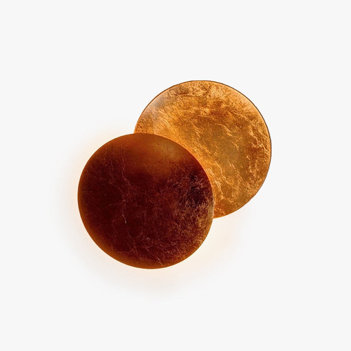 Stylish round indoor wall sconce with warm LED light. Modern Scandinavian metal design for home lighting.