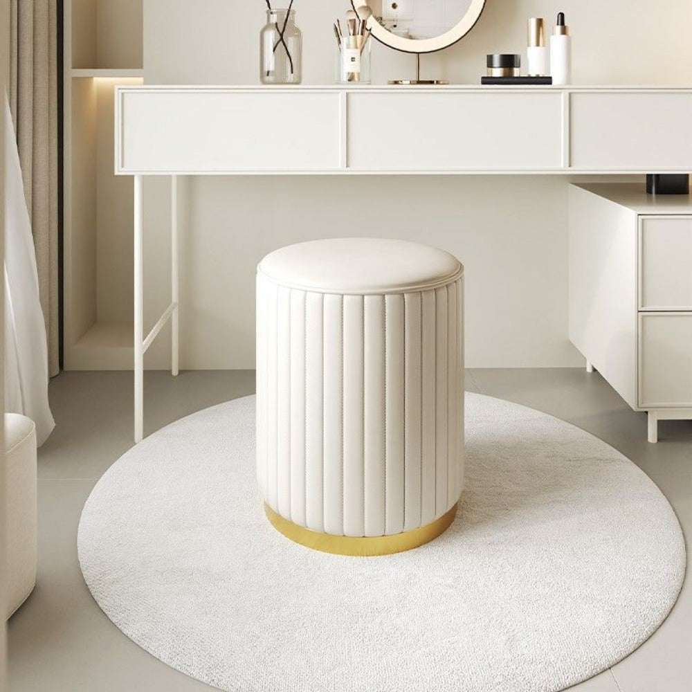 Fabric storage ottoman in a round shape, perfect for modern living rooms