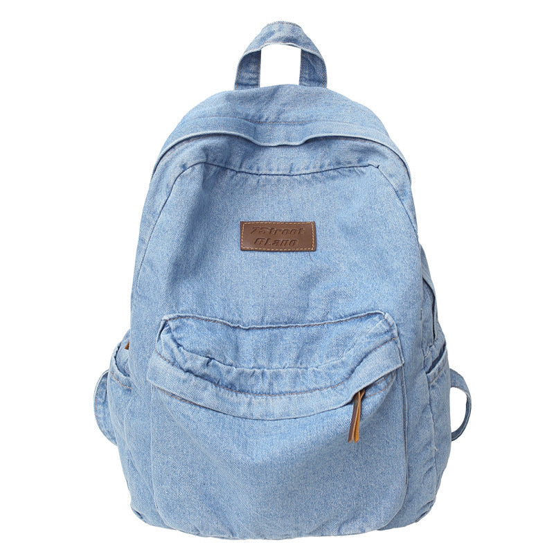 Durable denim unisex backpack, perfect for school, travel, or everyday use for students and adults.