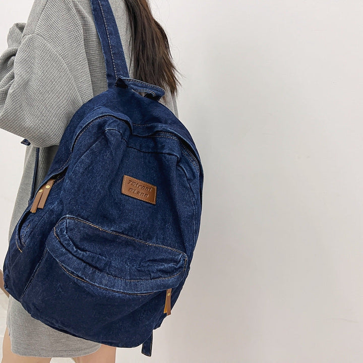 Comfortable and stylish denim school backpack for students, ideal for daily use and travel adventures.