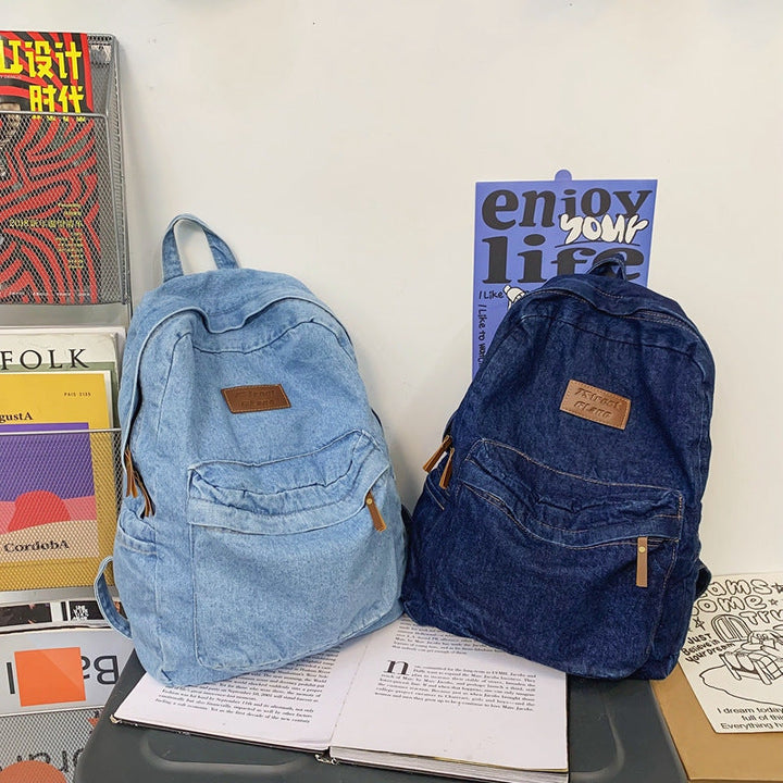 High-quality unisex denim backpack, a sturdy and stylish solution for students' school and travel needs.