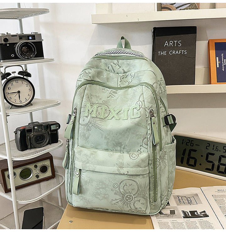 Vibrant graphic print unisex school daypack with ample multi-pockets for organization, perfect for students.