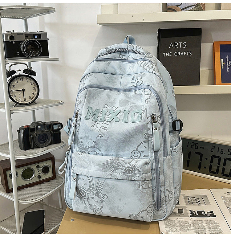 Unisex graphic print multi-pocket backpack, durable school bag & stylish daypack for students & everyday travel.