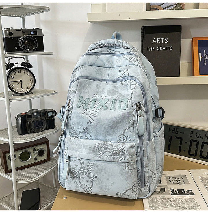 Unisex graphic print multi-pocket backpack, durable school bag & stylish daypack for students & everyday travel.