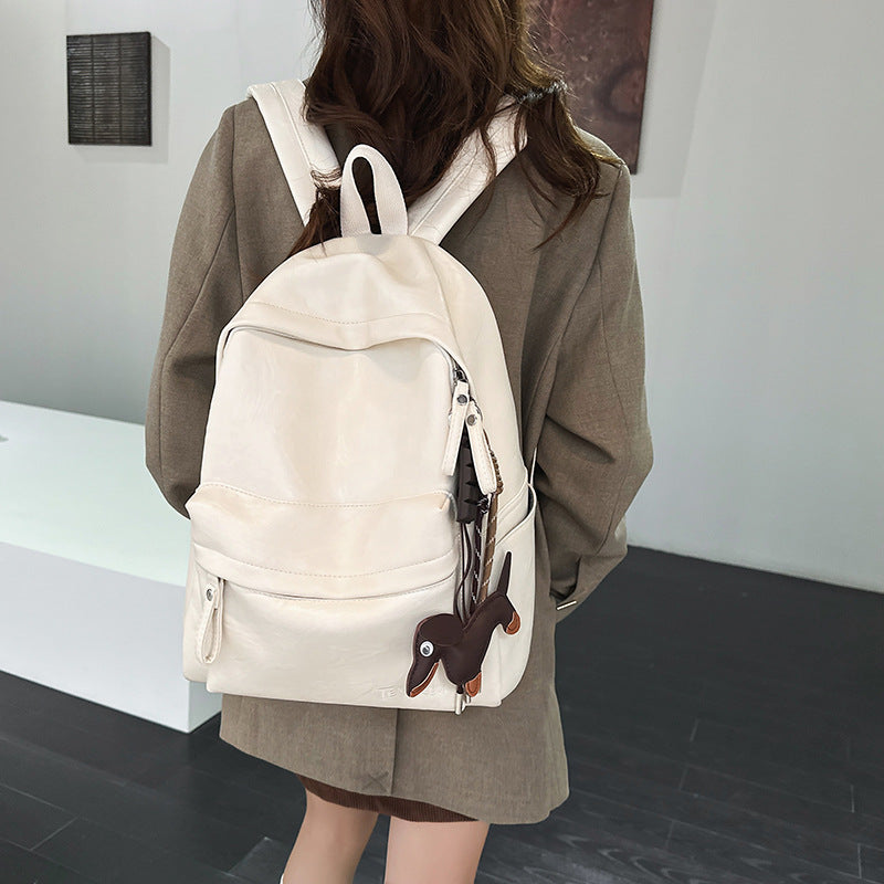 Stylish unisex leather backpack for daily carry, work, or school. Durable and functional design for everyday use.