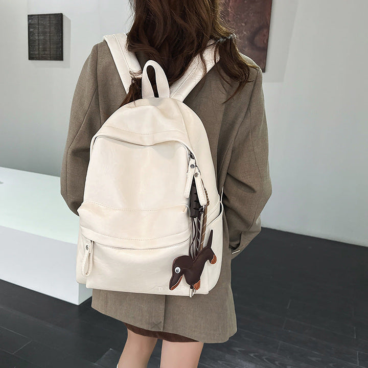 Stylish unisex leather backpack for daily carry, work, or school. Durable and functional design for everyday use.