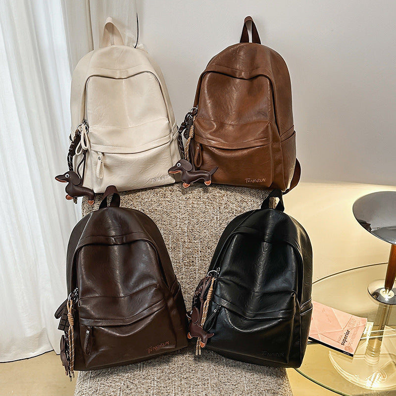 Elegant unisex leather school backpack. Ideal for work, study & daily carry. Roomy & comfortable for all ages.