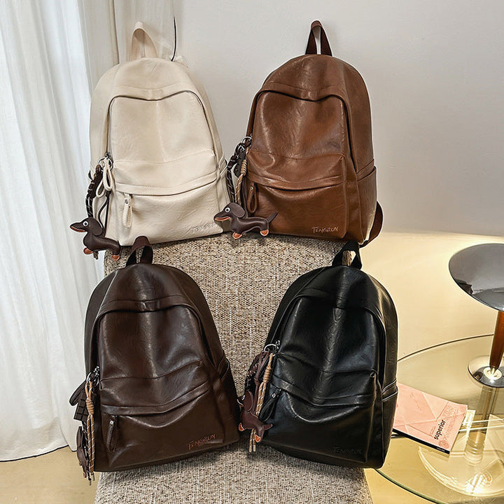 Elegant unisex leather school backpack. Ideal for work, study & daily carry. Roomy & comfortable for all ages.