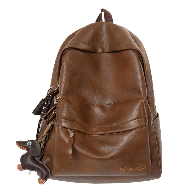 Rugged leather backpack showcasing quality craftsmanship & durable design. A perfect unisex bag for any journey.