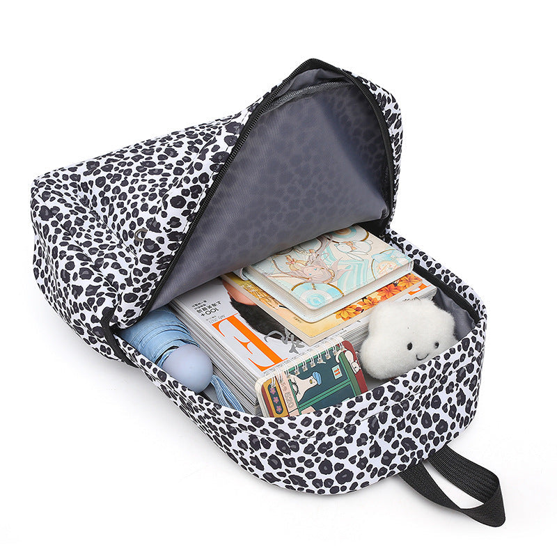 Modern unisex leopard print daily carry backpack set with essential cooler and pen case.
