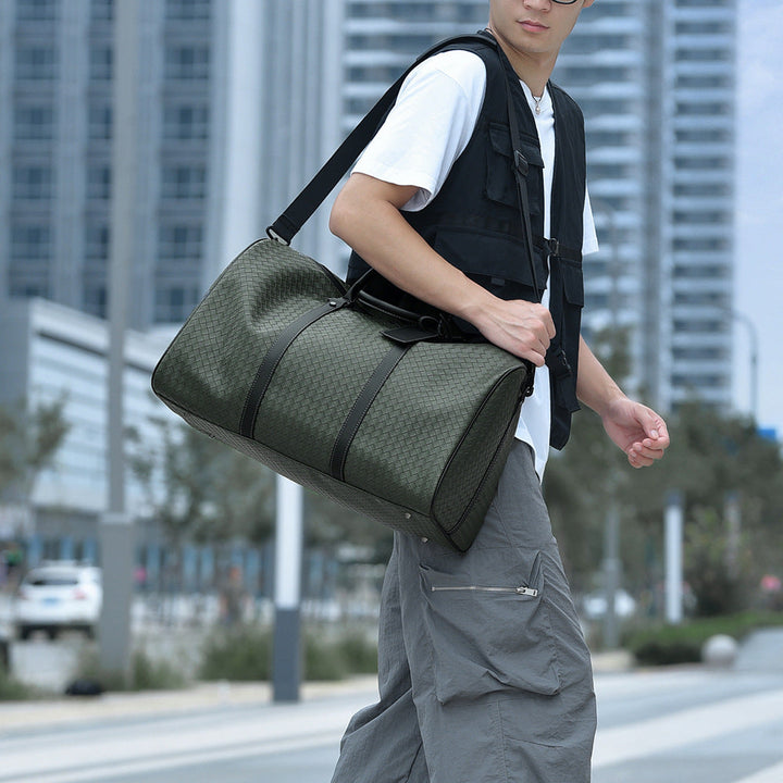 Elegant woven leather travel duffle bag for men & women. Perfect stylish carry-on for short trips.