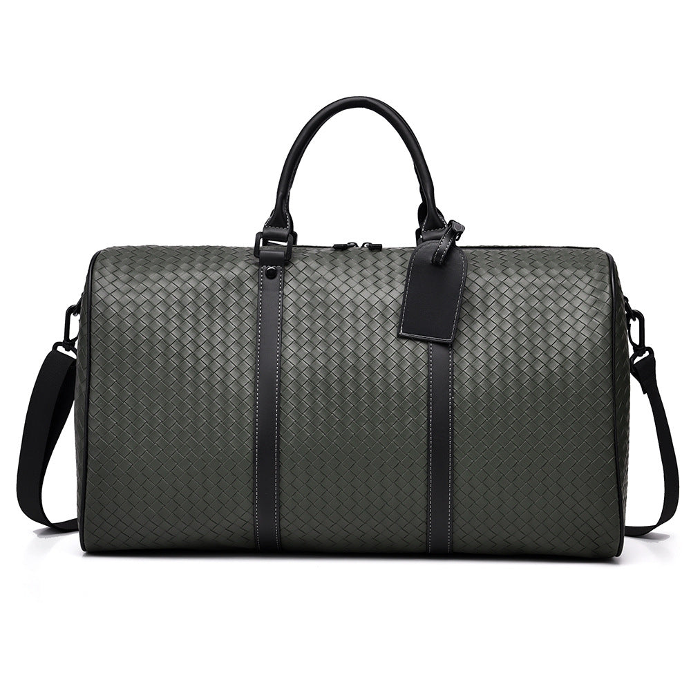 Premium woven leather travel bag with comfortable handles. Unisex duffle ideal for weekend adventures.