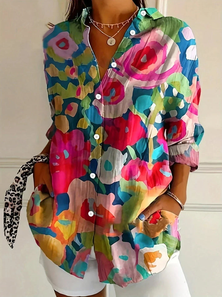 Trendy women's abstract print long sleeve blouse, a fashionable button-front top for modern style.