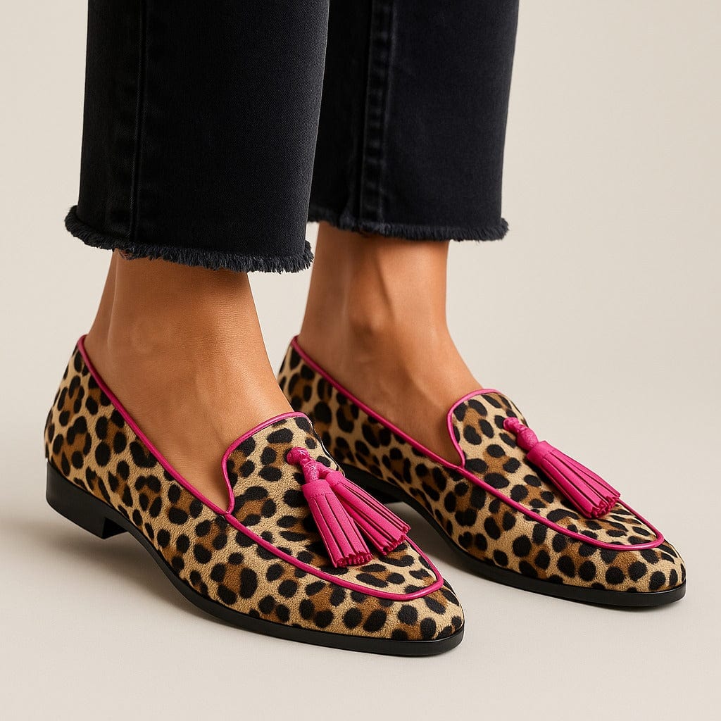Stylish women's animal print fringe loafers. Comfortable slip-on shoes for casual or fashion wear.