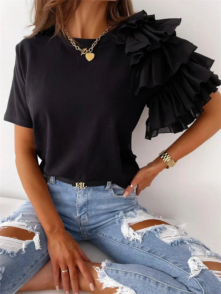 Elegant women's asymmetrical ruffle short sleeve blouse with round neck, ideal for spring and summer outfits.