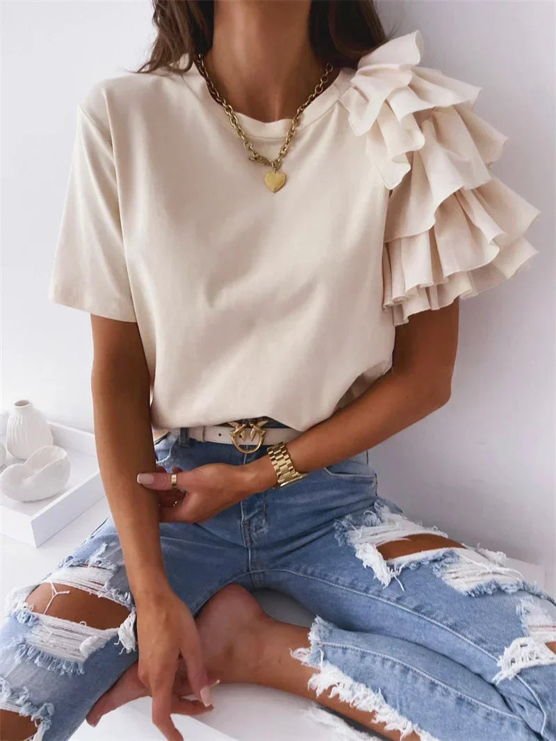 Trendy women's asymmetrical top with chic ruffle short sleeves and a round neck, a versatile summer blouse.