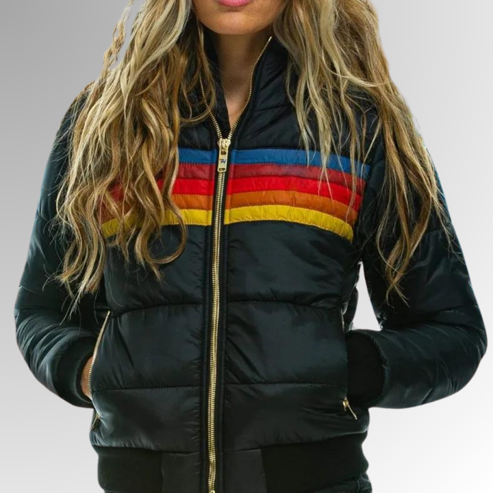 Blue women's zip-up quilted puffer jacket, a stylish & lightweight outerwear choice for fall & winter.