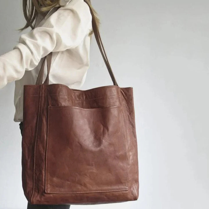 Chic women's genuine leather tote bag, a sophisticated everyday handbag with magnetic closure.