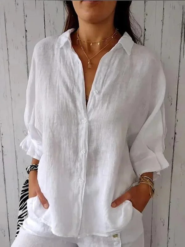 Comfort fit women's casual button-up shirt with long roll-up sleeves, perfect for relaxed everyday wear.