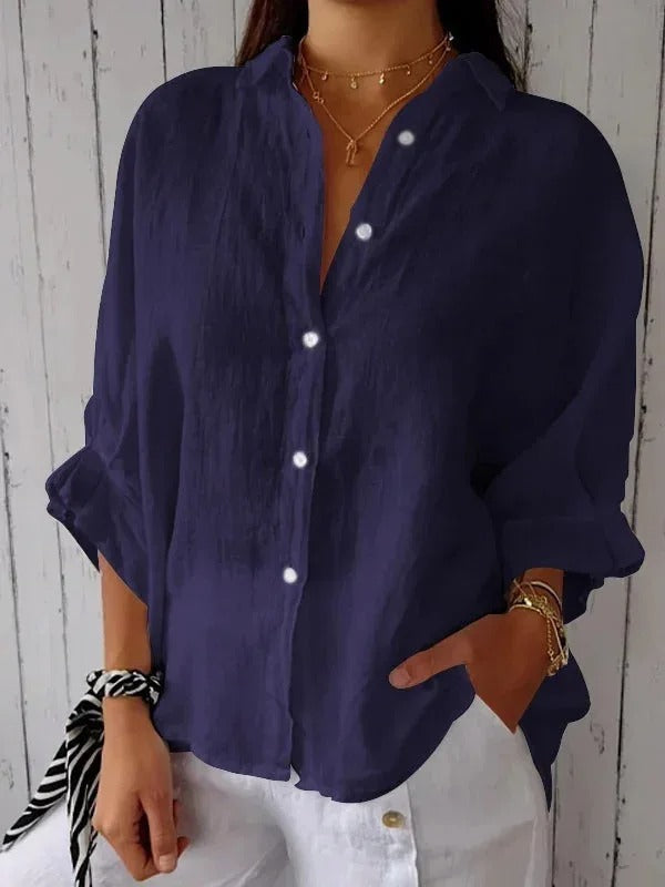 Versatile women's button-up top, long sleeve with roll-up feature, ideal for stylish casual outfits.