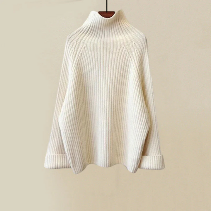 Warm women's two-piece winter set, a cozy knit top and matching pants, designed for ultimate comfort.
