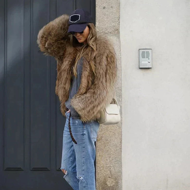 Stylish women's cropped winter jacket, perfect for casual chic or elegant evening wear.