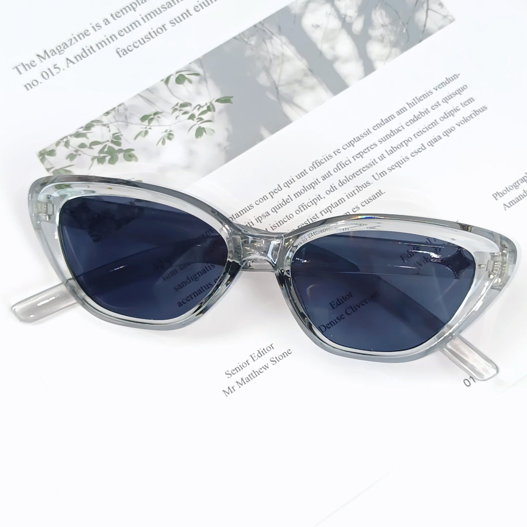Women's fashion eyewear: lightweight, UV protective designer shades with angled frames.