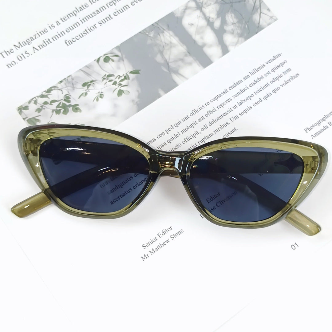 Modern women's stylish sunglasses, UV protection, designer angled frame for fashion.