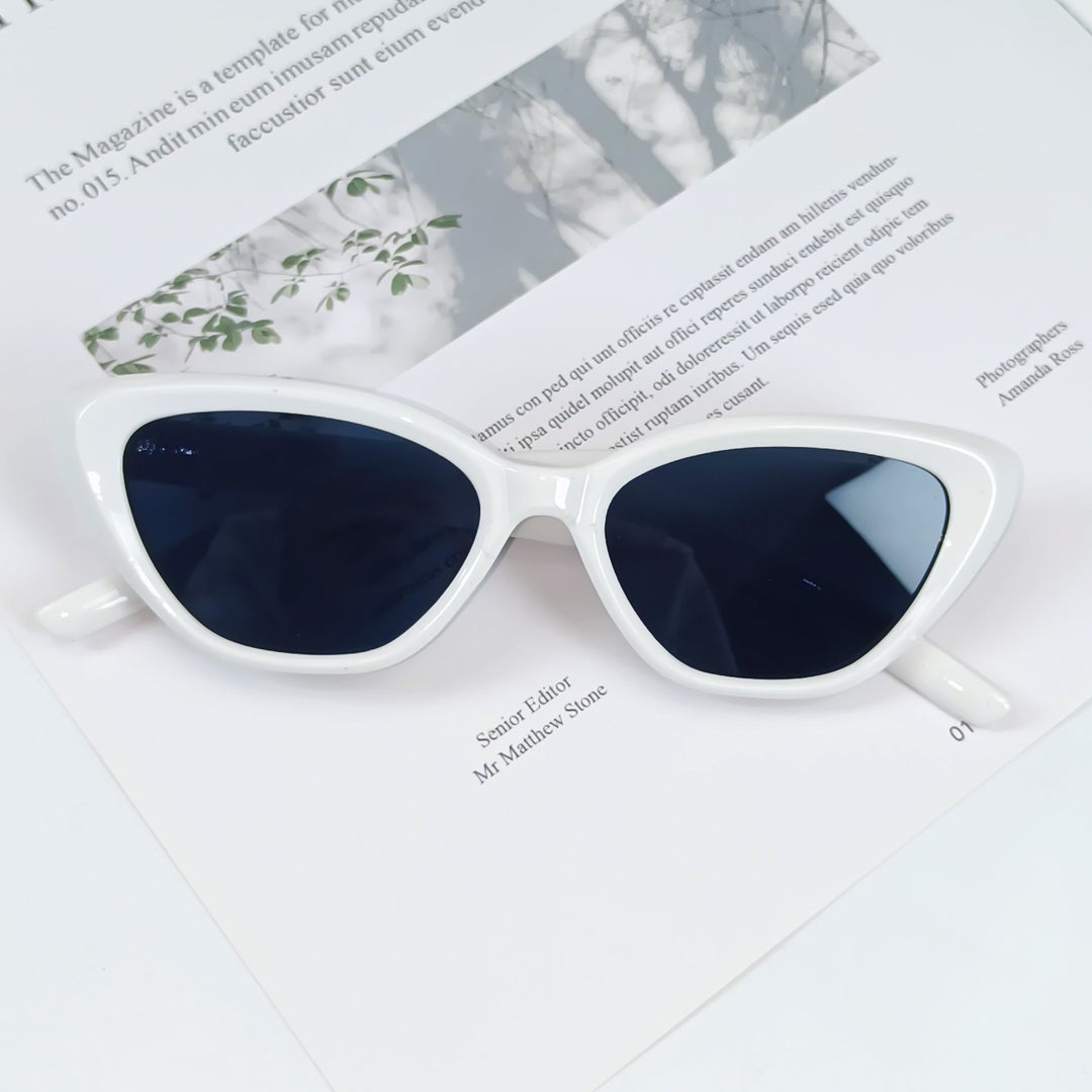 Chic women's UV protection sunglasses, designer angled frame for a stylish, modern look.