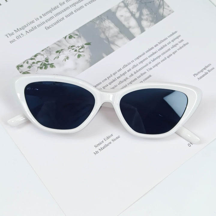 Chic women's UV protection sunglasses, designer angled frame for a stylish, modern look.