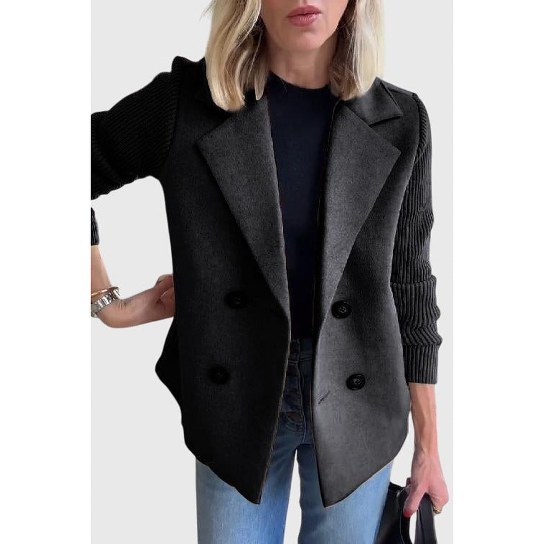 Versatile women's double-breasted blazer. Stylish tailored jacket for chic fashion and professional settings.