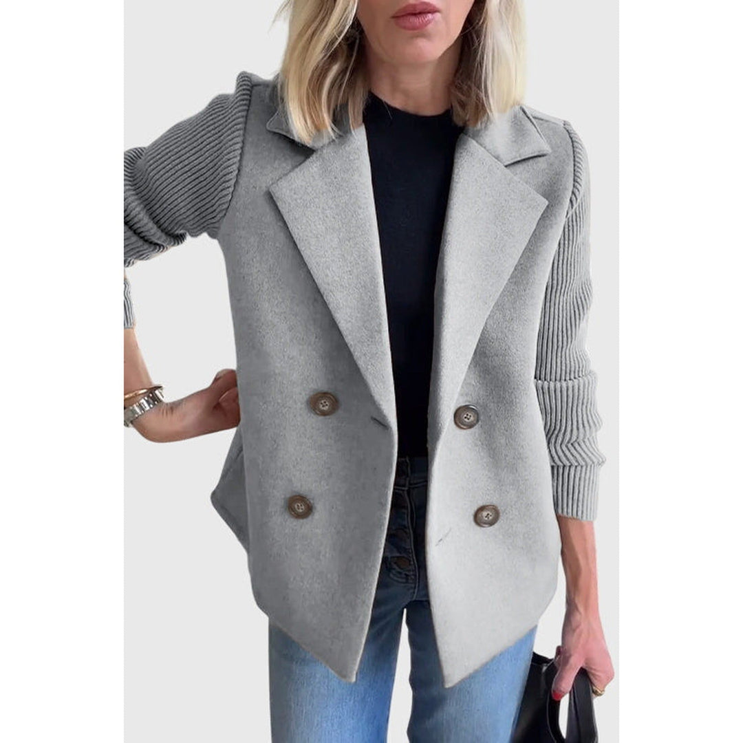 Sophisticated double-breasted blazer for women. Elegant outerwear for a professional or smart casual look.