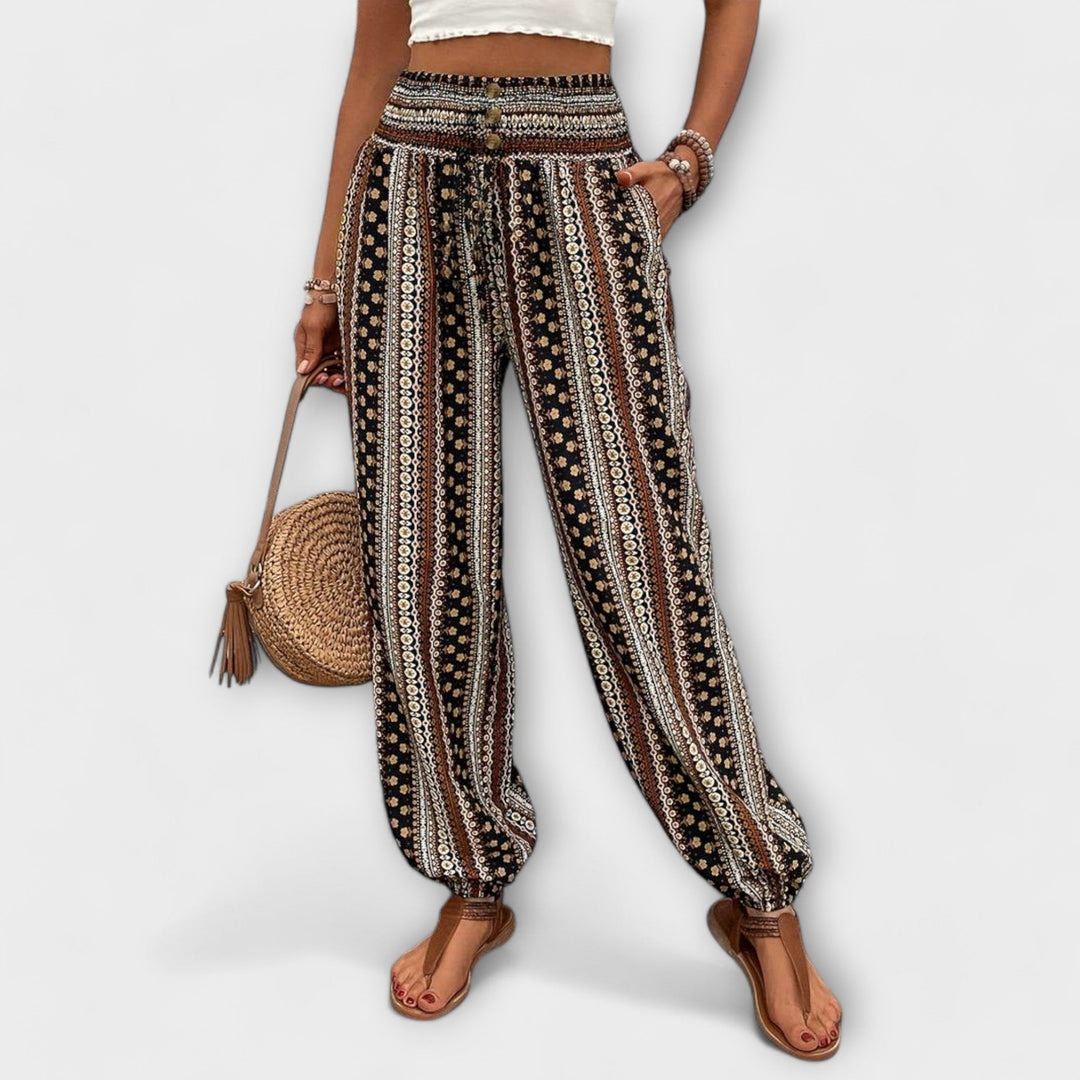 Stylish women's ethnic graphic trousers, comfortable and versatile for fashion-forward casual wear.
