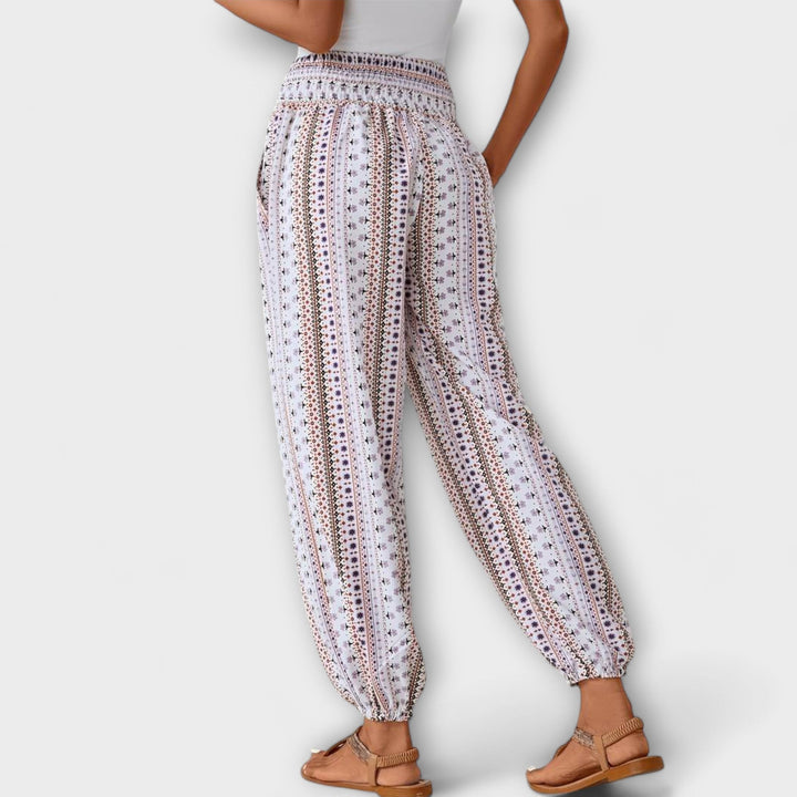 Back view of comfortable women's ethnic graphic trousers, showcasing the flattering fit.