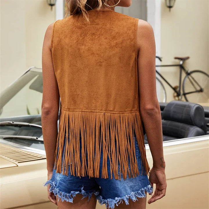 Edgy women's fringe vest, open front & sleeveless. A stylish outerwear piece with decorative studs.