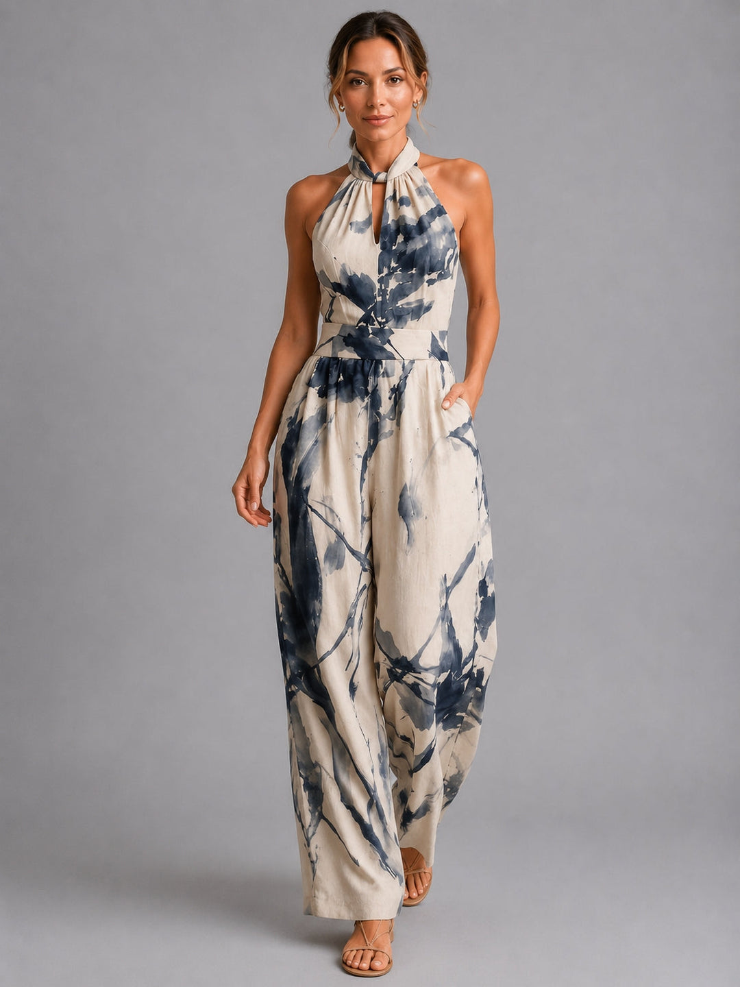 Stylish women's halter wide-leg jumpsuit, perfect for elegant summer fashion and comfortable vacation wear.