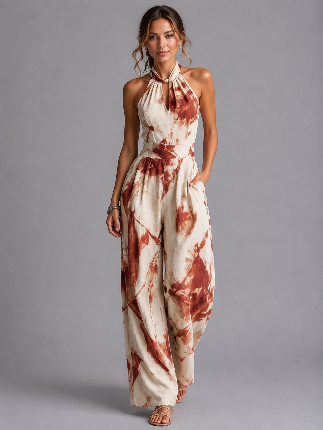 Women's halter neck wide-leg jumpsuit, a flowy and comfortable choice for elegant summer and vacation wear.