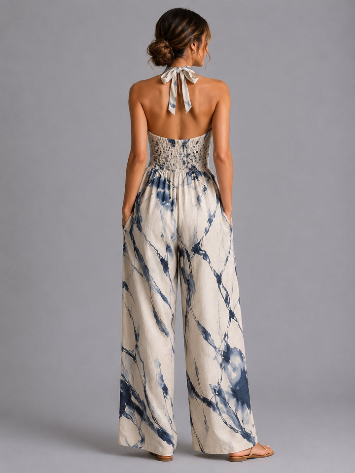 Women's stylish halter wide-leg jumpsuit. Effortless design, perfect for summer fashion, spring outfits, or vacation.
